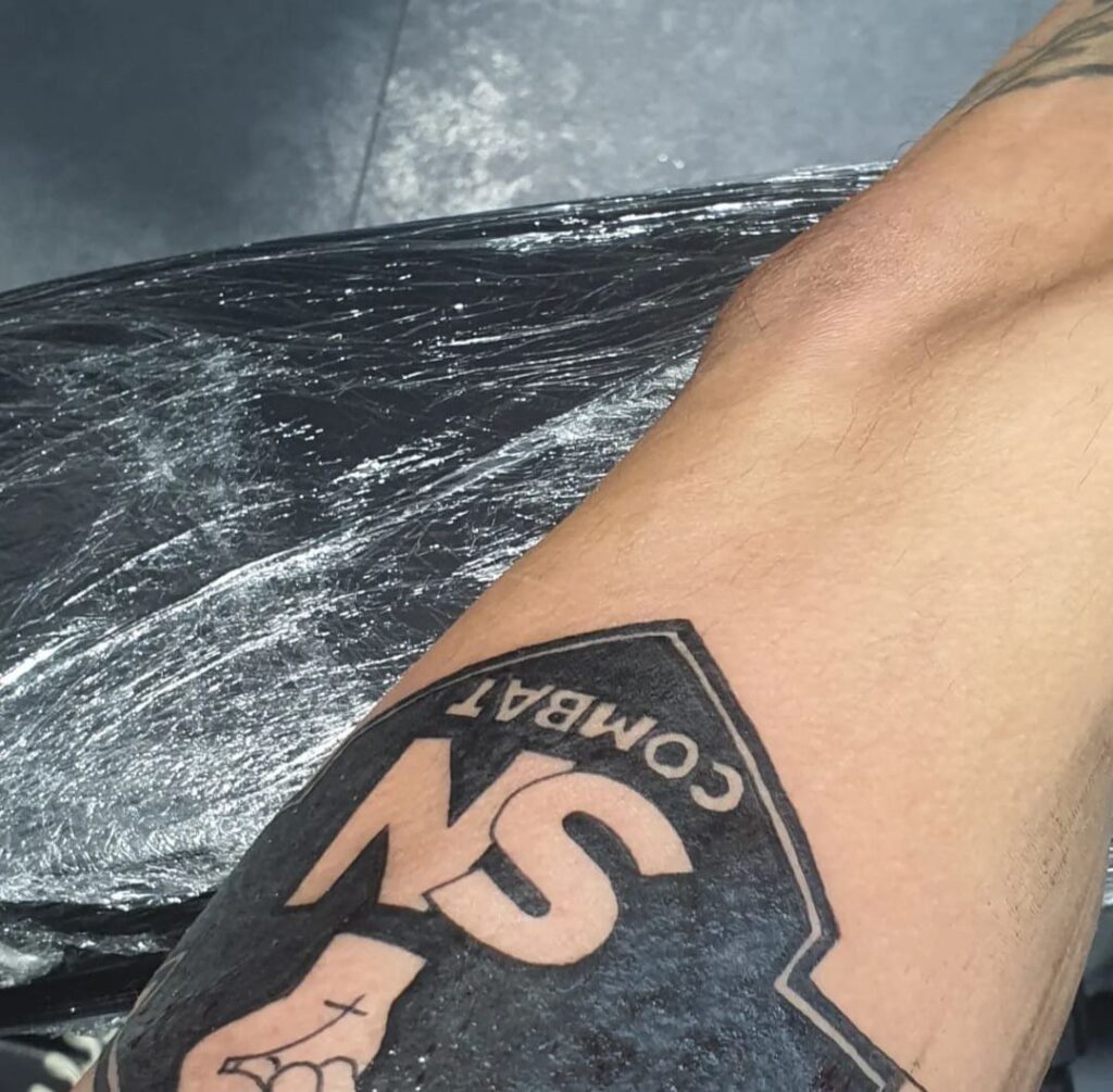 Ian Barrett is SN Combat for life tattoo