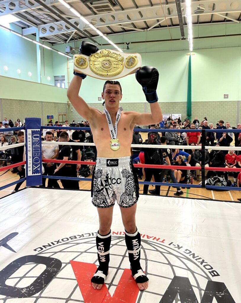 Shazhaib Ramjahn holding his world title belt