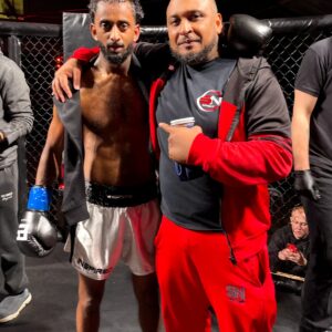 Siggy with his headcoach Khru Sam of SN Combat Academy