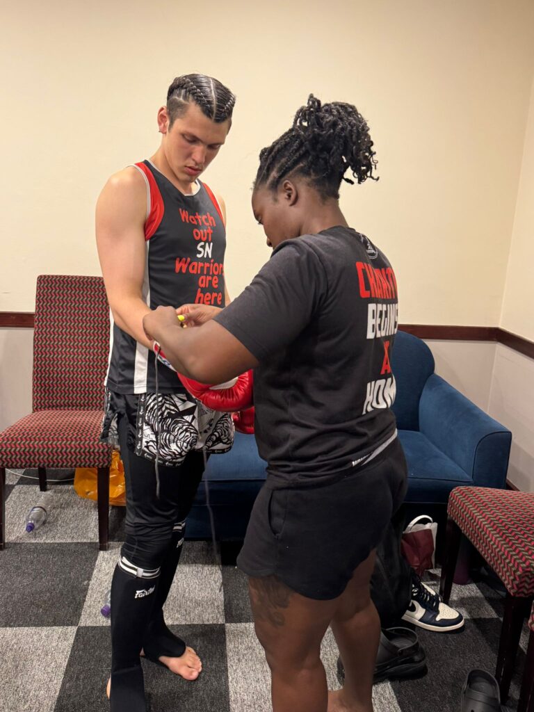 Shazhaib preparing for his fight with team instructor Elia Dewu