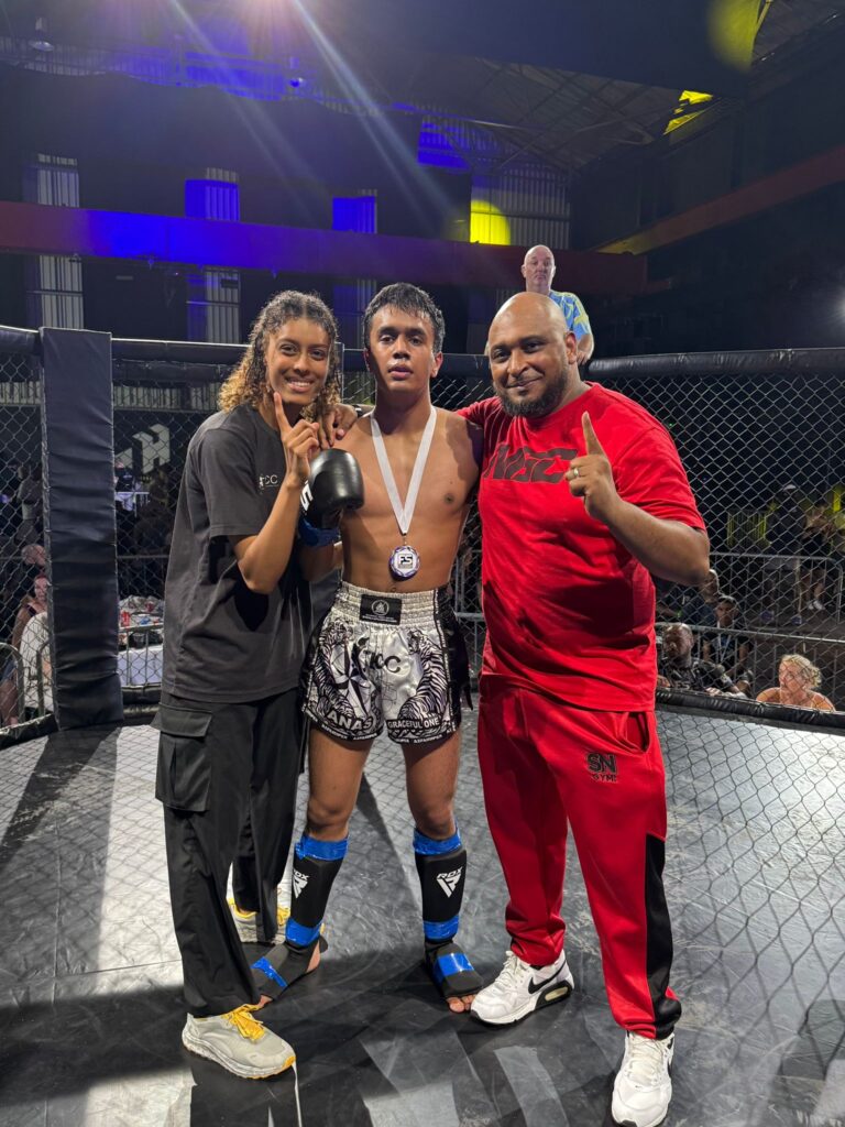 Anas Khan after victory in his K1 fight with his headcoach Khru sam Nankani and team mate Yasmin Ahmed