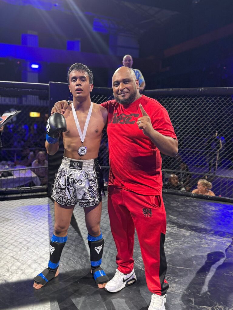 Anas Khan with headcoach Khru Sam Nankani in the K1 ring