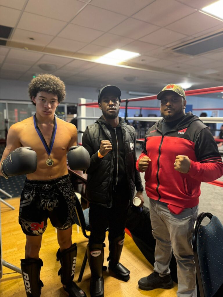 SN Combat junior fighter Saxon long side team mate and headcoach Khru Sam