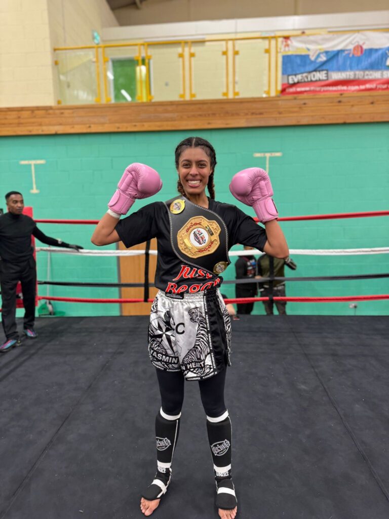 SN Combat Academy fighter Yasmin Ahmed, wiith her winners ASFO Muay Thai Champion 2026 belt