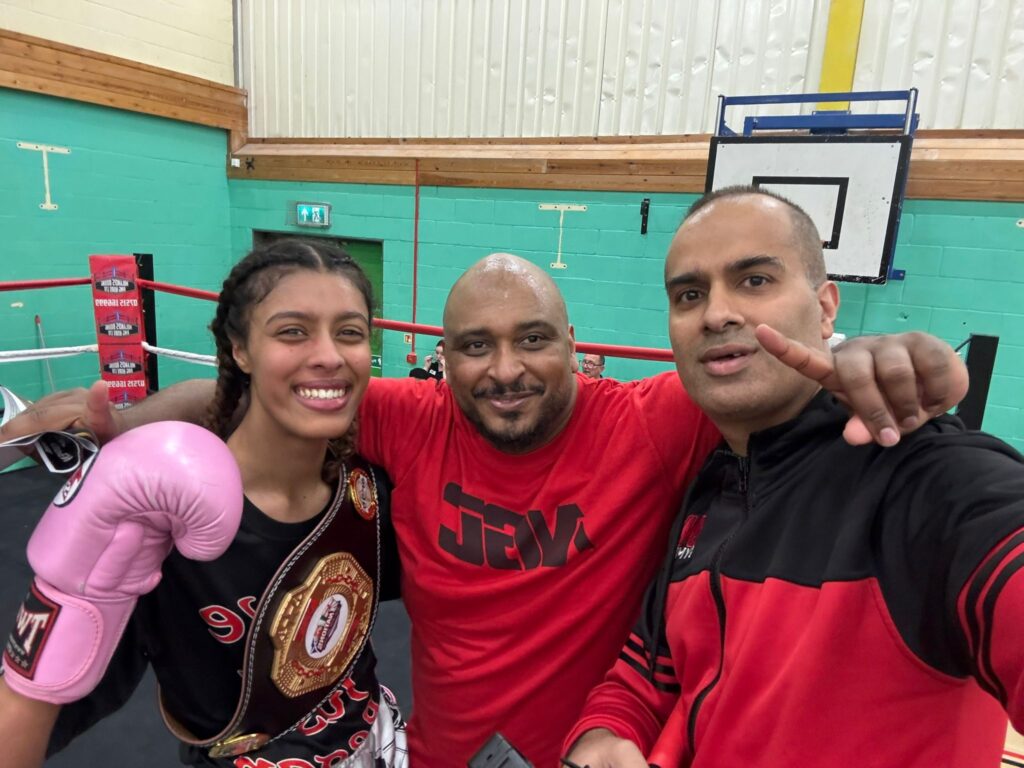 Yasmin Ahmed with headcoach and team mate at the ASFO Muay Thai Champion 2026