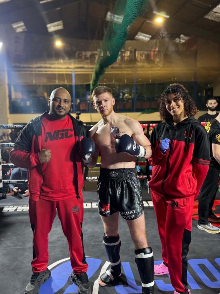 Danny Jackson with headcoach Khru Sam Nankani and SN Combat Academy student Yasmin Ahmed