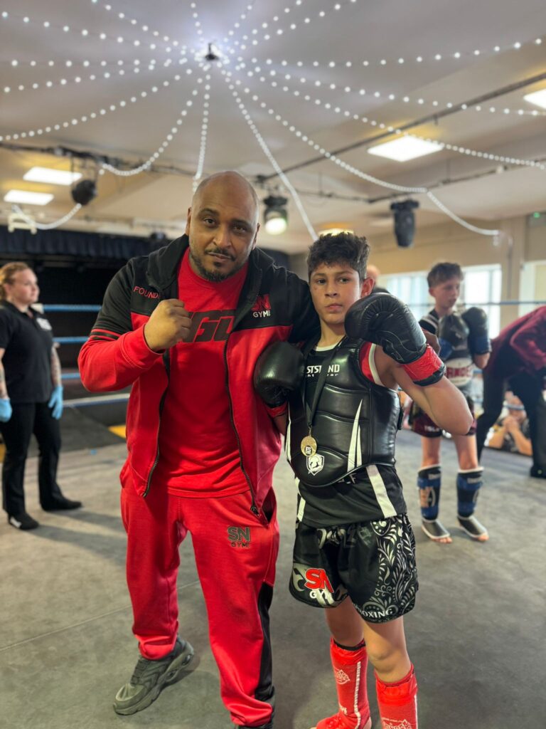 Ibby Mortimier at his junior K-1 fight with headcoach Khru sam Nankani