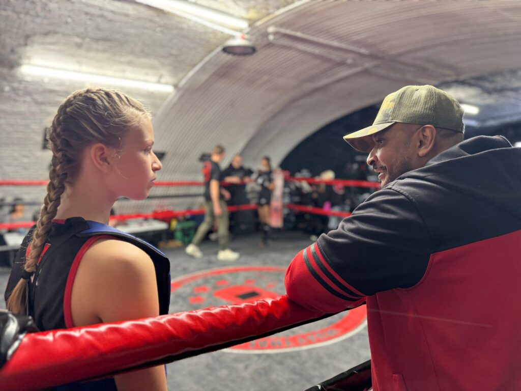 Legendary headcoach Khru Sam Nankani coaching his student during fight