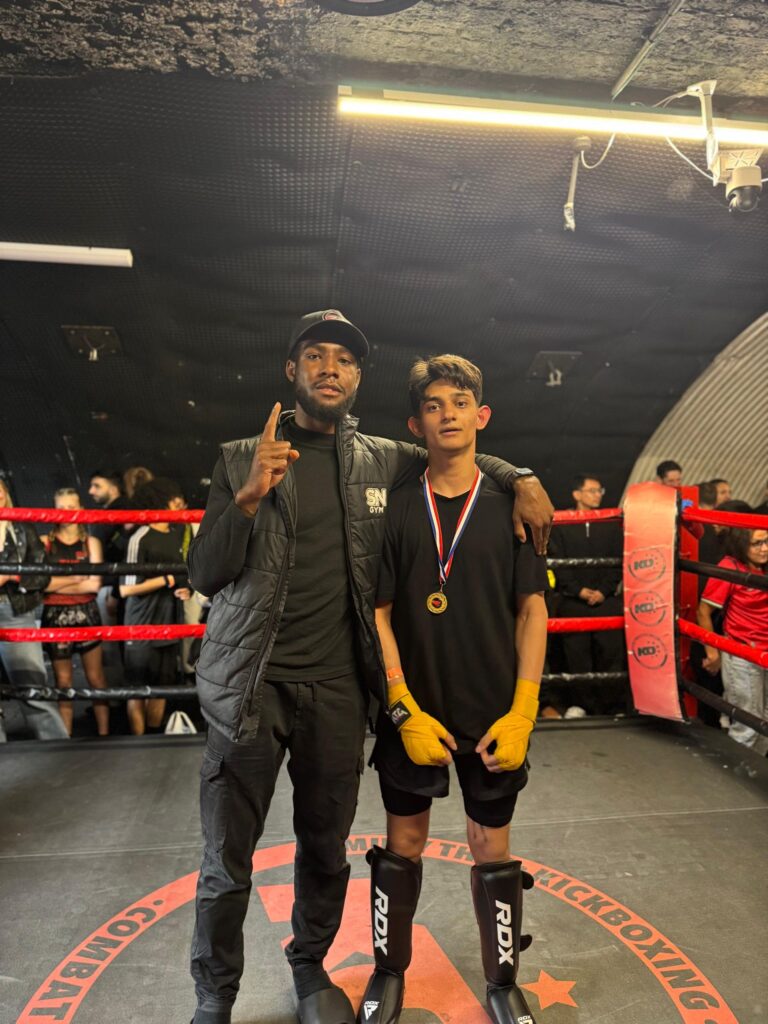Instuctor Nathan Lewis with SN Combat Academy fighter